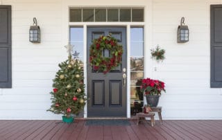 Christmas Decorations At Front Door of House.